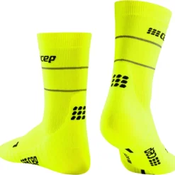 REFLECTIVE COMPRESSION MID CUT LÖPARSTRUMPOR