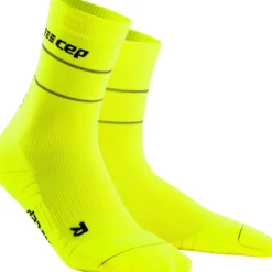 REFLECTIVE COMPRESSION MID CUT LÖPARSTRUMPOR